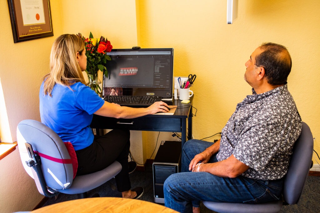 Dr. Laurent with a patient.